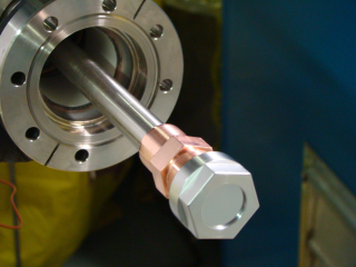 TPE Sample Holder, supplied by SNL-CA, holds 25-mm diameter tungsten samples